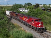 CP 254 slowly rolls by Newman Road as they approach Hamilton and their stop at Kinnear.  Leading todays train was ACU 7039 which was a nice change of pace from the usual GE leaders of late.