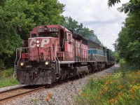 CP 5743 and CMQ 9011 lead a welded rail train towards Hamilton to have a meet with 246 at Kinnear.