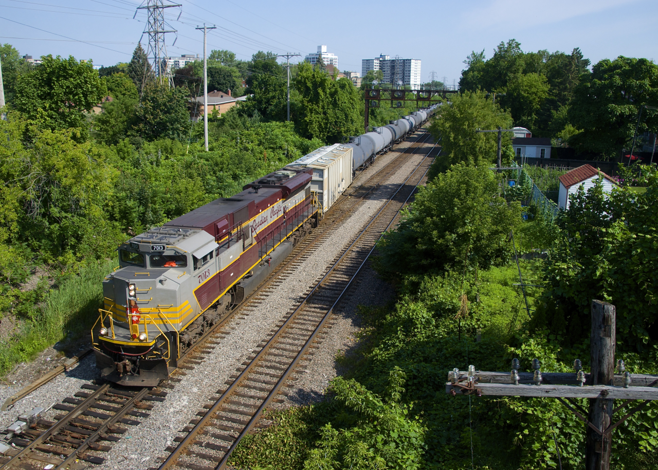 After changing crews a short distance from here, ethanol train CP 650 is on the move south with heritage unit CP 7013 leading.