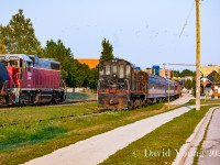 GEXR meets OSR in Waterloo? It happened. Goderich and Exeter local No. 584 is returning from Elmira passing  "Tar Baby" who was leased to the Waterloo Central in the summer of 2007 for their operations. Here she rests in the siding, coupled to WCR's mix of passenger equipment next to the "new" Waterloo station built for the upstart Waterloo-St Jacob's Railway a decade prior. To say this area has undergone a major facelift, would be an understatement. The WCR hasn't been based out of Waterloo in years, relocating their base up the line to St Jacob's after the ION light rail project moved in, forever changing this scene. 