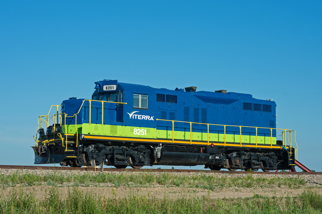 exCP 8251 sits tied down at the Viterra terminal in Belle Plaine Saskatchewan.  Looking at the surroundings, its rather easy to where the inspiration for this paint scheme came from.