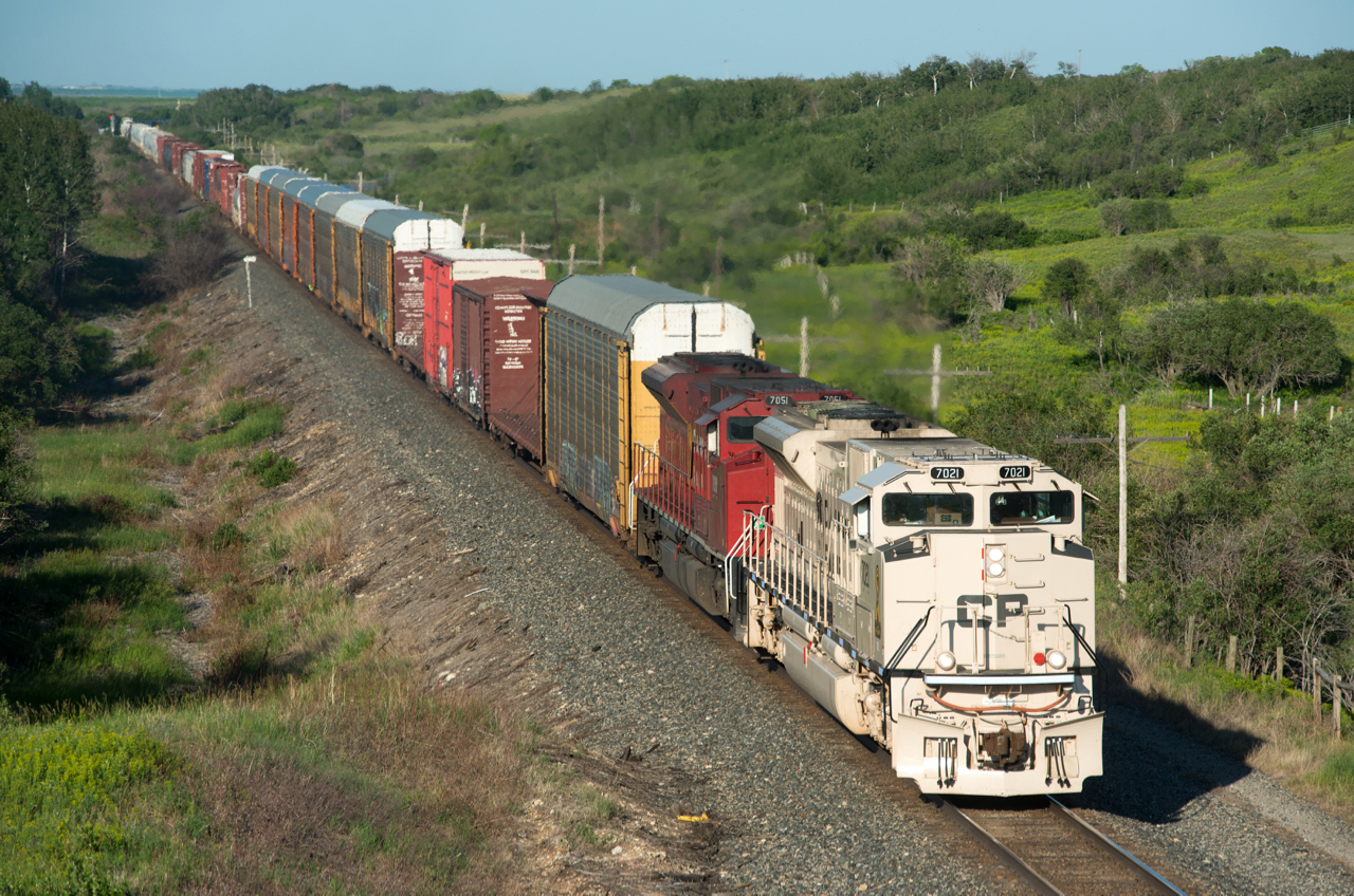 A nice Canada Day 2021 surprise came in the form of "arid climate" painted CP 7021 leading a westbound on the Swift Current Subdivision in some perfect light.