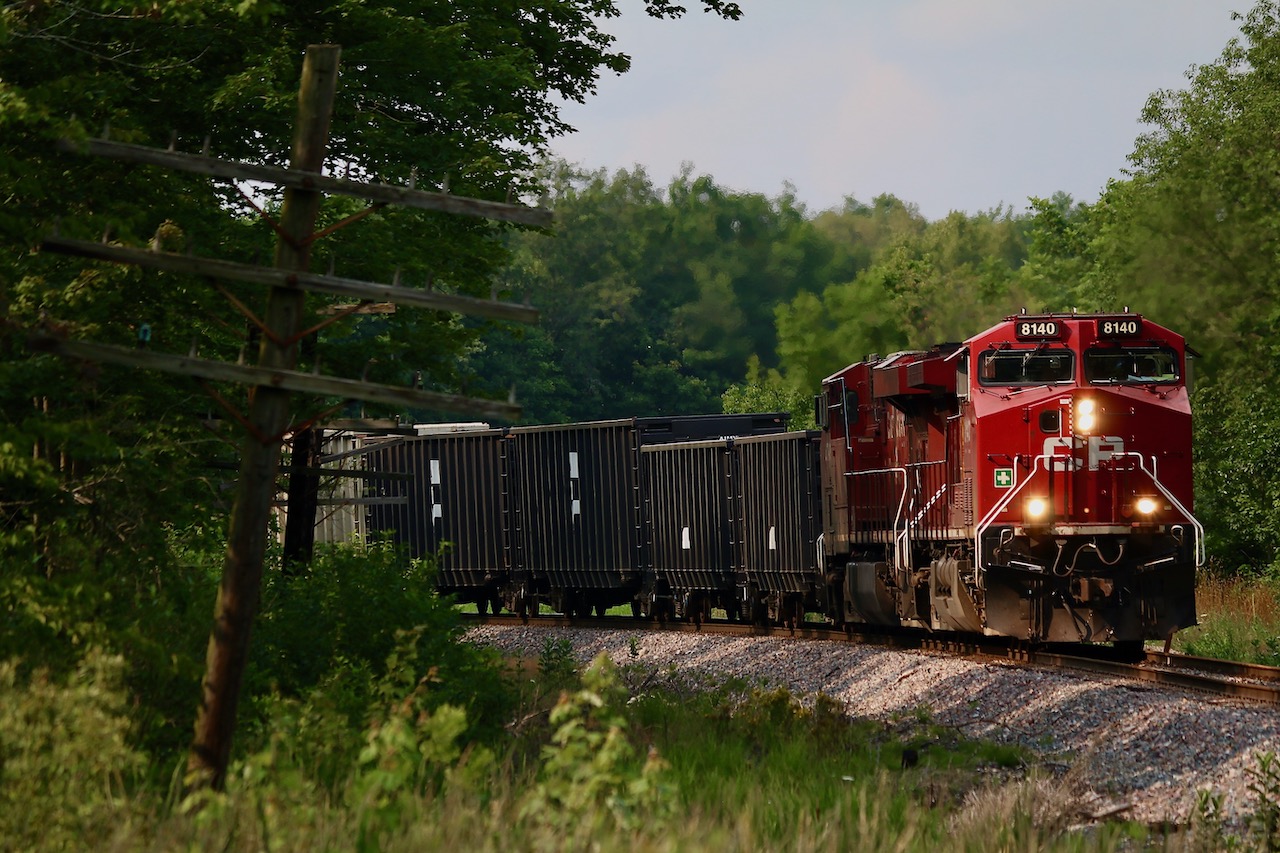 So thankful that CP over the past year has been busy clearing out a lot of the track side greenery along the Hamilton sub. opening up a lot of spots I have not been able to shoot for years. While train 254's power isn't anything to write home about, I was pretty happy with how this angle worked out. It's good to see a lot of the old telephone poles are still around as props today, decades after their purpose expired.