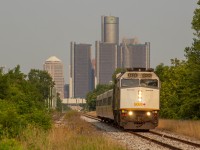 Via 72 Departs Windsor Ontario bound to Toronto Union, on an early and quiet morning, with the GM tower standing tall in the background.