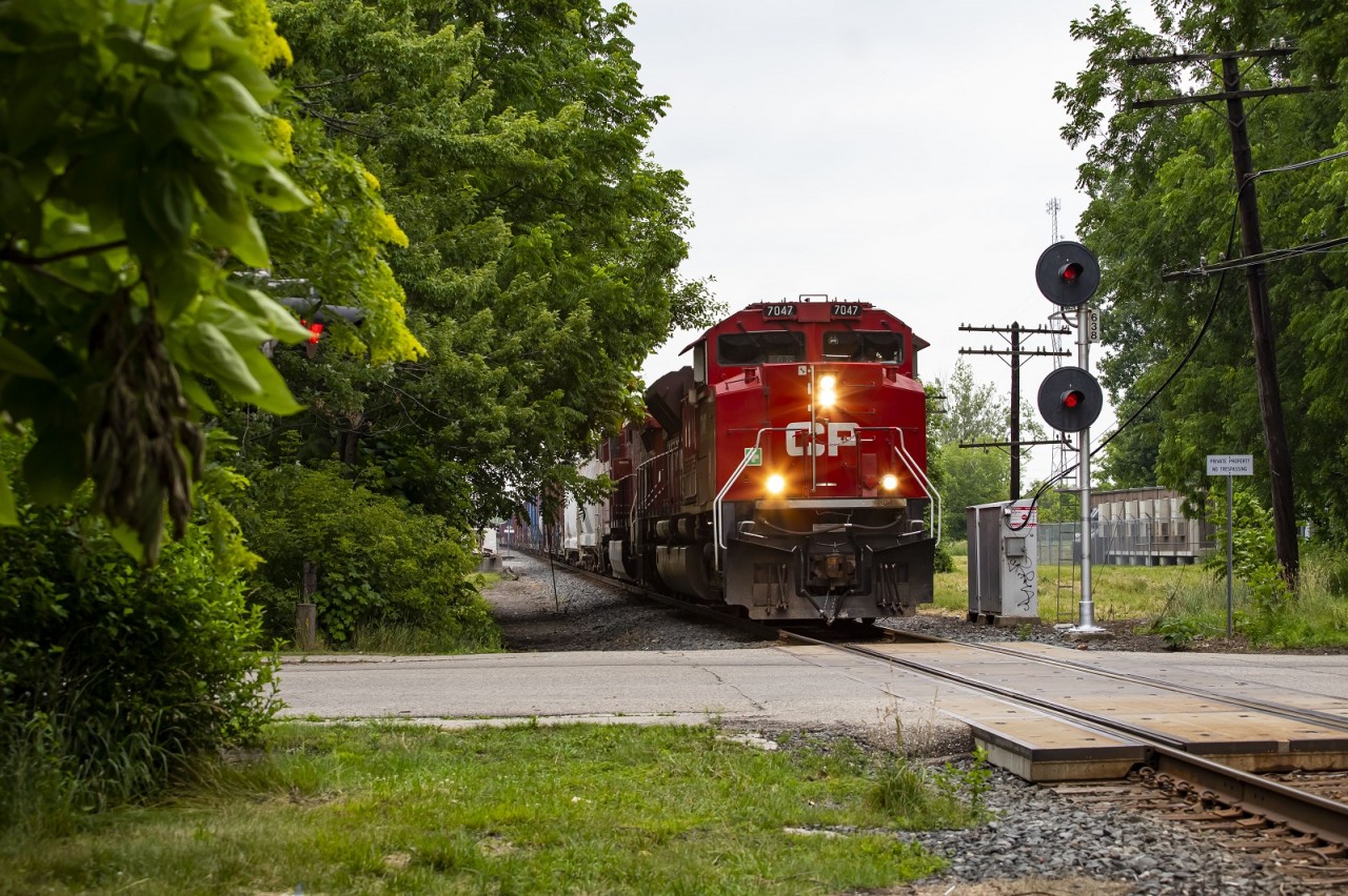 CP 651 passes the home signal for the now removed diamond between CP and the former C&O Sub 2 in Chatham.