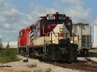 Ontario Southland Railway (OSR) Job #1 with GP9u's 1620 and 1591 work the large Polymer Distribution Inc. (PDI) facility at Massey Road on the Guelph Junction Railway (GJR) South Industrial Spur in Guelph, Ontario. 