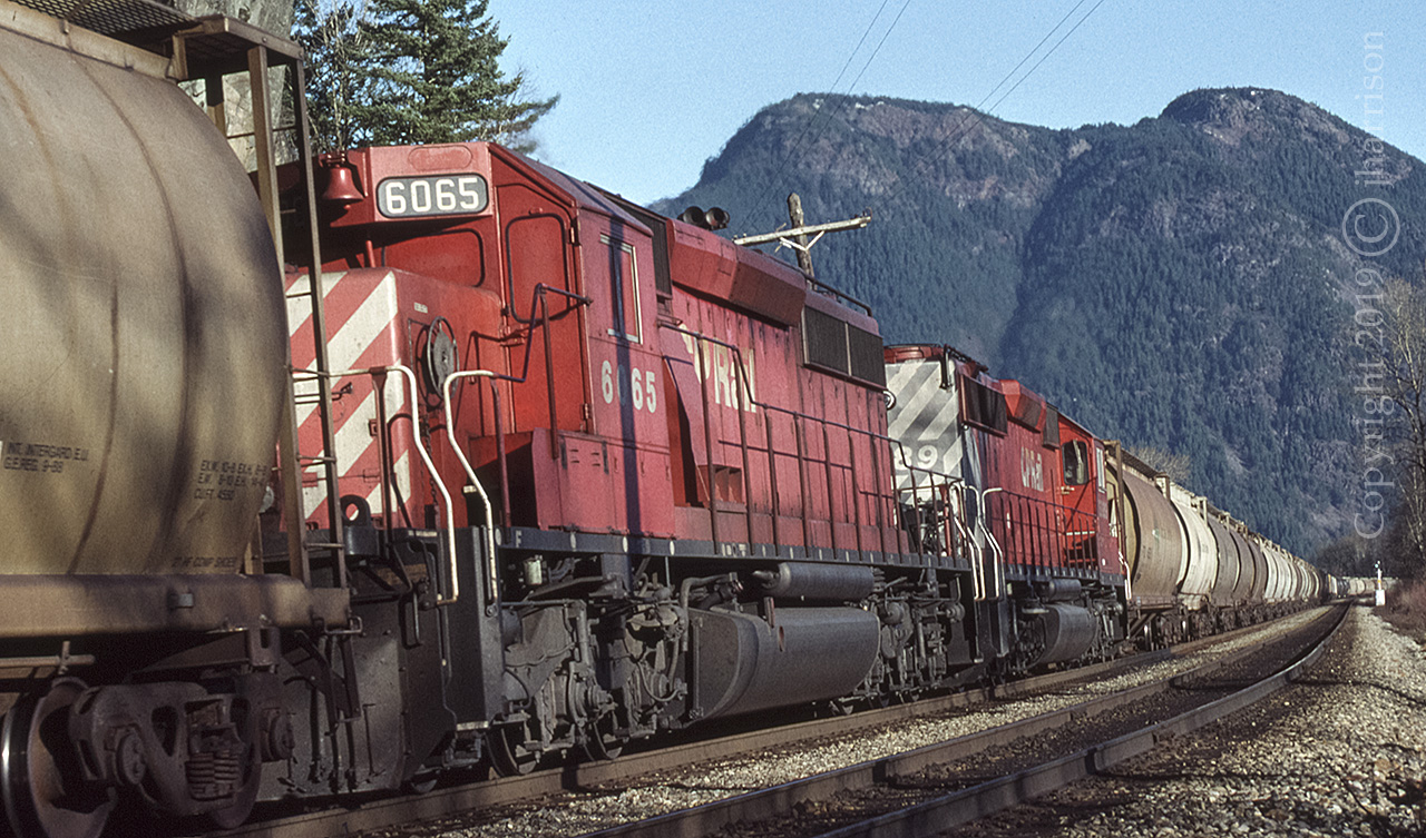 B-Unit 6065 traveling with westbound CP 9010 at Agassiz, January 22 1995. I presume the second unit is the 6089. My notes indicate that I missed another one.
