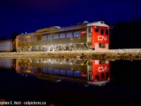 With 1501 parked in Guelph, I took the opportunity to shoot it and found a nice puddle to reflect it in. <a href=http://www.railpictures.ca/?attachment_id=38193 target=_blank>I did a shot of it in daylight</a> and decided to go back at night and give it another try, to my amazement the marker lights were still on.<br><br>I also <a href=http://www.railpictures.ca/?attachment_id=12219 target=blank>shot this thing in 2006</a> being sent to CN (as 15016) for rebuild. Built in 1958 as CN D-108, it's been neat to see this thing return to CN and basically travel coast to coast to coast every year and thensome.
