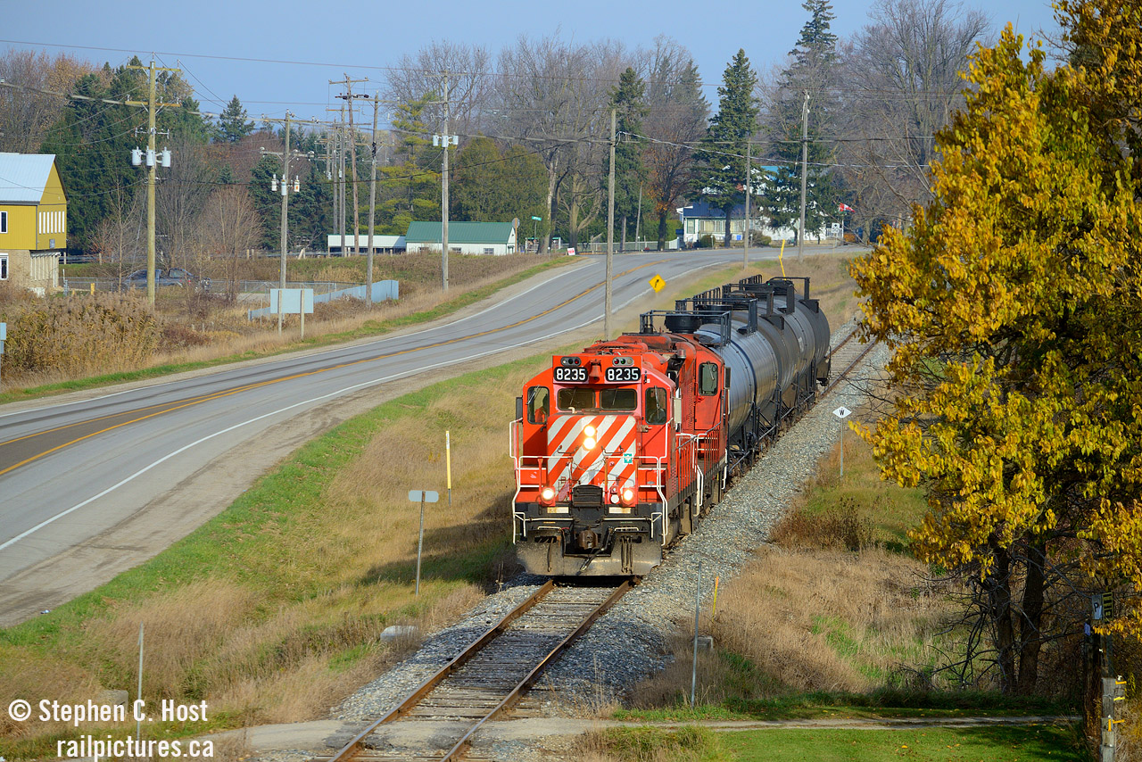 To me, this is classic CP on the St. Thomas Subdivision. While I did spent time on the mainline in the early to mid 2000's, the branchlines called me quite often and I was often one of the few photographers that ventured down the St. Thomas Sub to regularly catch the action. You either found the Frame Train, one of the twice daily CAMI turns, or a St. Thomas (Putnam) turn which ran I think 5 days a week. Furthermore, a pair of GP9's were common on most trains, anything else was actually a bit of a rarity (GP40's, 38's, but they did regularly cycle through).Basically, if you told someone who was last here 15 years ago nothing had changed, and they stared at this picture, they'd be none the wiser. But, it is the Ontario Southland Railway :)