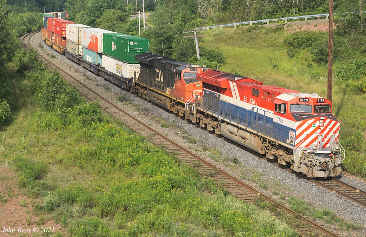 July 24th, 2021 @ 09:31, CN Z120 by Springhill junction, 578 axles, CN 3115 (BCOL heritage), CN 3075, + DPU CN 3864.