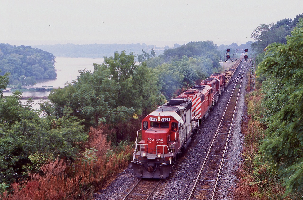 It was a muggy overcast morning but definitely a photo worthy consist this day. Back then it was often a crap shoot whether CP trains would take the Hamilton subdivision up to the Galt sub. or the CN shortcut to the CANPA sub. Often CP 167 would take the CN as it made switching easier at Obico yard. Today this is all a fading memory and everything has been rebuilt at Bayview Jct. The SOO SD40's were a treat to catch, but catching a red barn and ex NS SD40 "B" made it even more special this day. wish I caught more CP train on the CN but glad I caught the few I did.