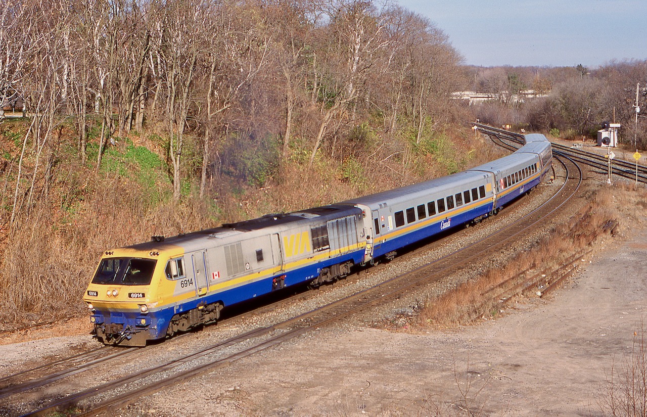 Late in their careers VIA's LRC engine were hard to catch west of Toronto. I only caught them a couple of times including this day as well weathered 6914 is in charge of train 73 as it heads onto the Dundas sub. at Bayview Jct. Most of the time the units could be found often in pairs on express trains 66/67 between Toronto and Montreal. Thankfully a couple survive today in Canada as museum pieces.