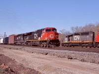 Aldershot always seemed like a busy place back then, with a fair bit of congestion thrown in. Here CN 392 with a Dash-9 and IC's oddball second hand SD40-2 6072, a former MKT unit pass 421 in the yard with a former straight CN SD40, rebuilt by Alstom into a SD40-3 and now a CN/WC unit. The new third track construction can be seen progressing in the foreground.