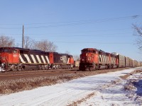 I think this is the only time I managed to catch two pairs of SD60 / SD50 cowls in one frame. As for the SD50's their days were definitely numbered and within a few years they were off the roster, as for the SD60's they lasted until a few years ago. Trailing 5432 I believe was the only SD50 to wear CNNA paint although the map by this date was in terrible shape. The new third track roadbed was levelled by this date and can be seen in the foreground, and the old Aldershot cold storage building was still standing. 