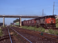 A locomotive model I wish I had more time to document. Bombardier's HR-616 never lived up to its builders expectation, but was certainly an impressive sight out on the rails. In the early 1980's CN purchased a number of examples of the model, which was basically an upgraded M-636. Unfortunately very problematic, the units spent as much time out of service as in service. They were captive to Eastern Canada and by this date were not far from retirement along with the rest of the surviving MLW and BB units on CN's roster. Here HR-616 2107 leads Niagara bound train 449 through Aldershot on a nice summer's day.