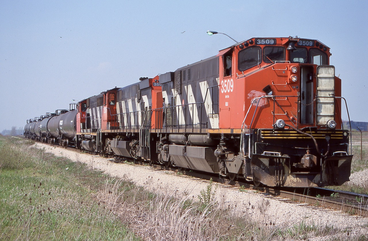 Back in 2000 Railink's M420's were still regular power on road trains, and this day motive power issues had the railway borrowing a CN GP40. The train is nearing the hydro plant gate and will retrieve a cut of covered hoppers in the small yard located within the plant. I'm not sure if this section of track is still active today with the hydro facility reportedly shut down years ago. This day it was a nice treat as they ran all the way to Brantford in daylight after finishing their work in Nanticoke.