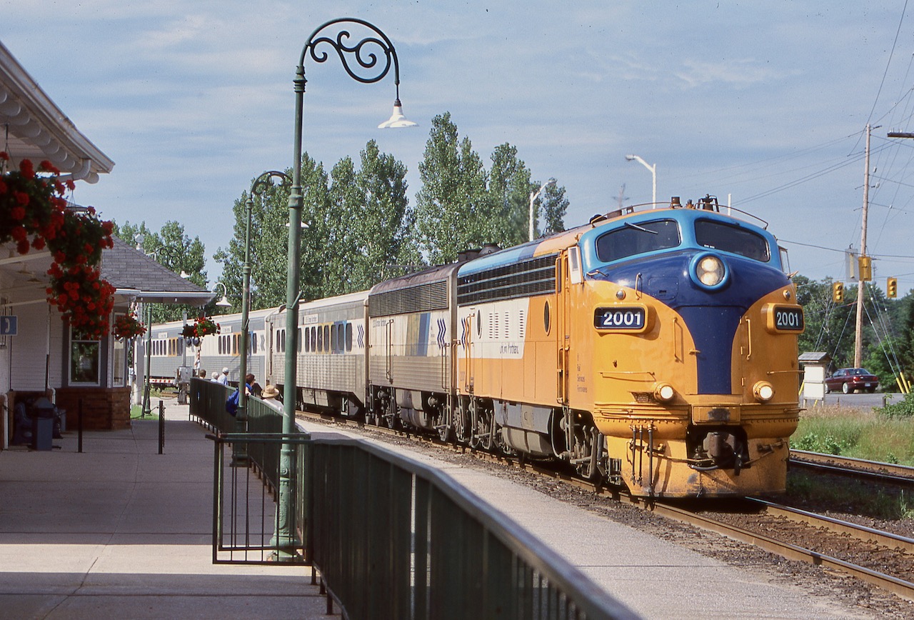 One thing I truly miss these days is catching the "Northlander", especially with its CAT powered "F" units. I truly hope it returns again one day. Here the train is seen slowing for a stop at Gravenhurst's attractive station. The station today doesn't look right somehow without any passenger trains stopping in front of it, with passengers waiting on the platform.