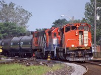 The Railink days were certainly the more interesting days. Railinks roster had a great mix on EMD's, MLW's and BBD's. The railroad owned four M420's and a pair of BBD HR412's, the M's spent most of their time assigned to Hamilton and Brantford while the BBD's mainly stayed up in North Bay. This day the train out of Garnet made a rare daylight move to deliver a short train of tank cars to CN, with M420 3502 and 3508 bracketing one of the railroads GP35's. The lead unit has its Canadian style air conditioning on full, LOL. Sadly RailAmerica's takeover of Railink would bring and end for the MLW/BBD units, with the M's going to the Hudson Bay Railroad, and eventually scrap.