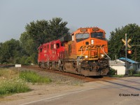 CP T69 is westbound at Drumbo just before 19:00 on a pleasant summer evening. The BNSF tagged along on the eastbound run to Guelph Jct. earlier and stayed on westbound to London. This light power move included BNSF 4229-CP 2269-CP 4514. 