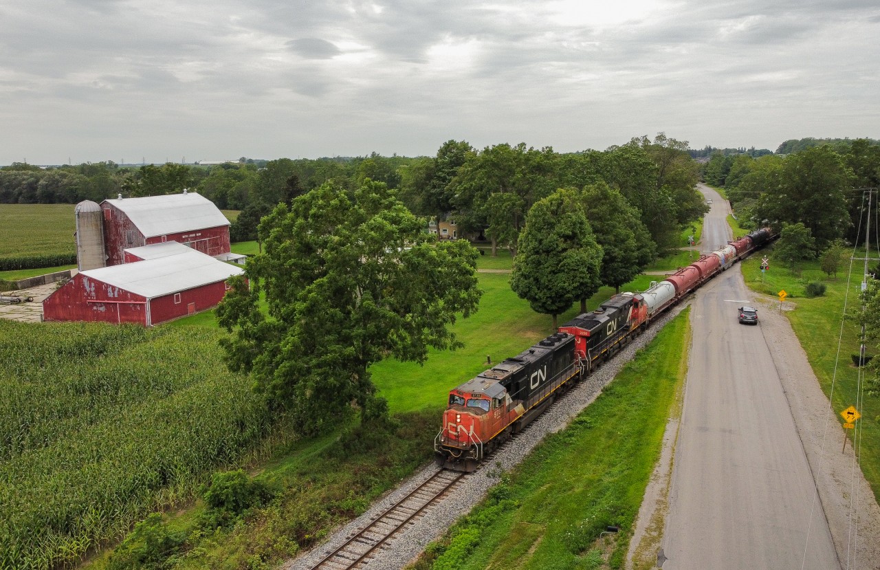 CN L502 breaks the silence at Old Onondaga Road as CN 5730 heads for Garnet after a recrew at Brantford.  The drone came in handy on this overcast afternoon making a shot possible that doesn't stand much of a chance of having perfect light on it unless the train is EARLY.  This was the 3rd out of 4 movements that we shot on the Hagersville on this day.  We chased L580 to Hagersville, then L501 from Garnet to Brantford, followed by L502 Brantford to Onondaga before getting L580 returning North to Brantford.