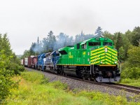 On it's maiden voyage, NBSR 6401, ex Norfolk Southern, powers New Brunswick Southern Railway train 907 shortly after departing Saint John, New Brunswick. Finally nice to see NBSR's new engine in service, after months of being in the shops at Mayfield, Kentucky. 