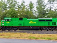 Panning New Brunswick Southern Railway 6401, an SD70M-2, ex Norfolk Southern, as they head by Vespra, New Brunswick. This was the engines first revenue run.
 