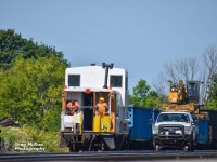 A CP MOW crew has a little meet and greet on the point before shoving the train across the crossing and out onto the mainline
August 14th 2021