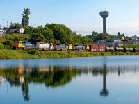 Southbound 214 following the shores of Cobalt Lake with 2101, 1740, 2105, and 2102 in the lead. <br><br>
MP103 Temagami Sub - July 31