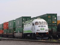 2021.08.25 MPEX 679 (GO 679) with a cut of cars set off at Lambton Yard by CP 246-25