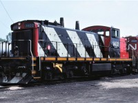 Fresh out the back shop, CN 1402 pauses on the shop track at Capreol, Ontario on June 25th, 1989.  The unit was built in 1958 as GMD-1 1913.