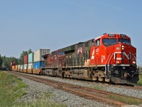 CN Q 19651 25 gets underway after a crew change at Edson with CN 3233 and CP 9700.