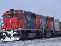 A westbound CN freight comes off the Halton Sub at Burlington, Ontario.  Power is a standard CN SD40 #5032 and M420 #2529.