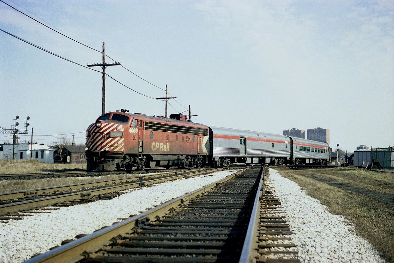 Before the formation of VIA, we used to see a CP passenger out of Toronto northward to meet the Montreal section of the Canadian at Sudbury.
Here is CP 4069 leading the train up the MacTier sub; crossing over the CP North Toronto sub, (having just left the W. Toronto CP station) and (foreground) CN Weston sub.
Quite the configuration of track at the old Toronto Junction district !!