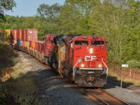 An oddball, a CP 143/ 651 combo takes the curve at Crow Lake. 
It's nice to see one of CP's newer units, a SD70ACu, take the lead of high priority trains once again.
