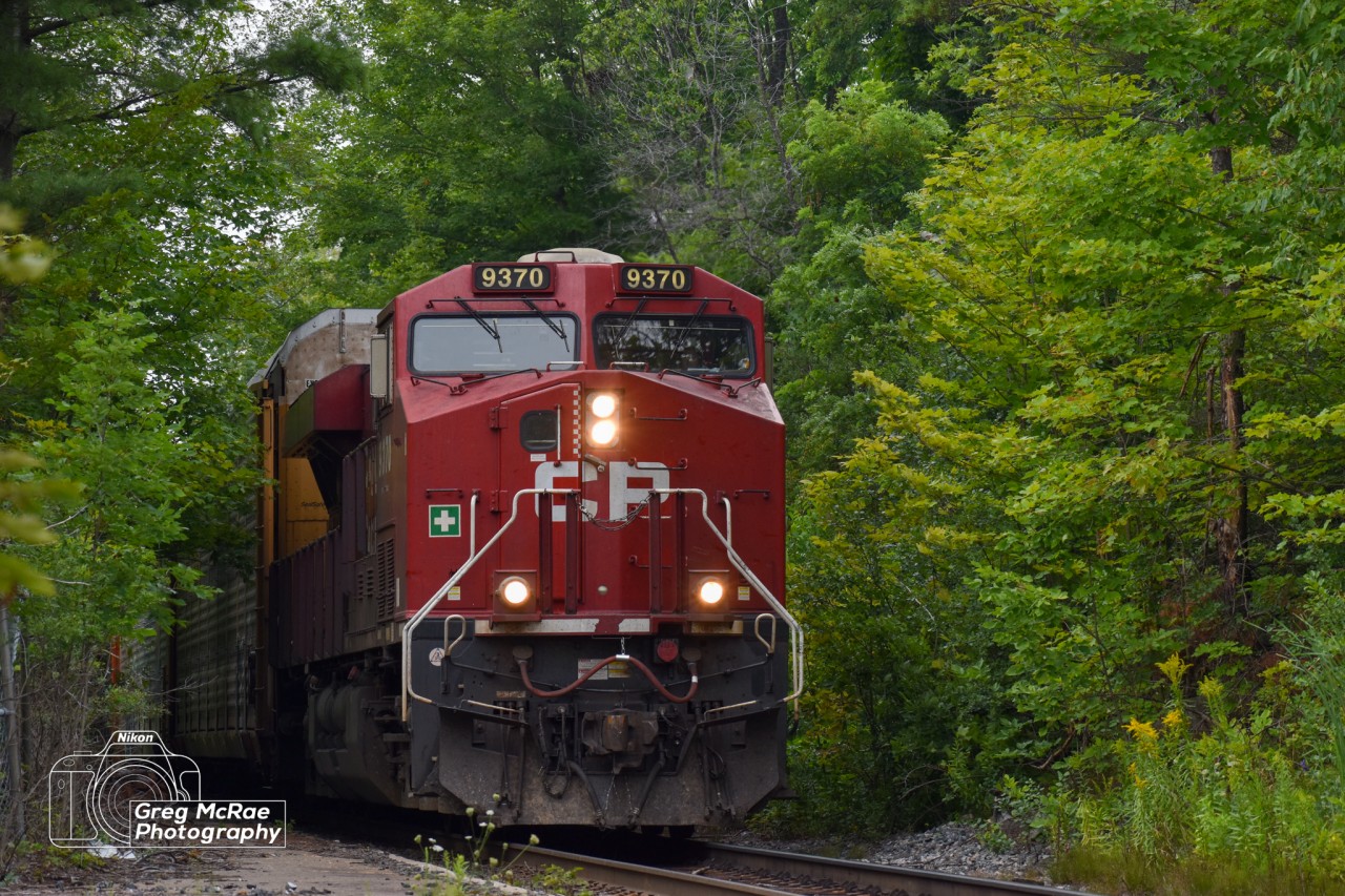 CP 9370 crawls past the Parry Sound VIA station on the CN Bala Sub (Southbound only track)
August 9th 2021