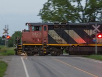 CN 2423 breaks the early morning silence at the Mine Road Crossing outside of Caledonia Ontario.  It is only a few minutes past sunrise as the crew on L501 makes their way towards Sarnia from Garnet with a lengthy train.  With so many C40-8M's being retired and scrapped by CN...having a few be reactivated has been quite the treat.  Get them while you can, when you can.