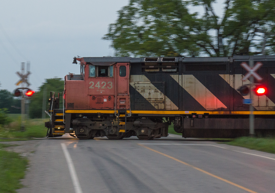 CN 2423 breaks the early morning silence at the Mine Road Crossing outside of Caledonia Ontario.  It is only a few minutes past sunrise as the crew on L501 makes their way towards Sarnia from Garnet with a lengthy train.  With so many C40-8M's being retired and scrapped by CN...having a few be reactivated has been quite the treat.  Get them while you can, when you can.
