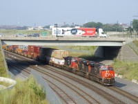 CN 2928, CN 2342 & CN 2546 are the head end power on CN 121 as it passes underneath the Sainte-Anne de Bellevue Boulevard overpass.