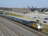 Monday saw an increase in VIA Rail service throughout the Windsor-Quebec City corridor, necessitating the return of Renaissance trainsets for the first time since before the start of the pandemic. Here Quebec City-Ottawa VIA 37 has wrapped VIA 6437 and seven Renaissance cars as it passes the Turcot interchange.
