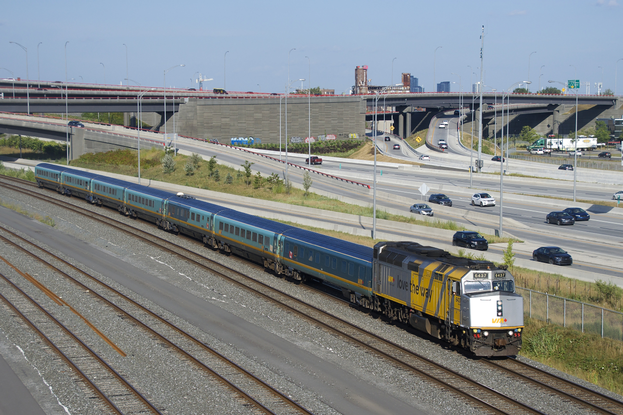Monday saw an increase in VIA Rail service throughout the Windsor-Quebec City corridor, necessitating the return of Renaissance trainsets for the first time since before the start of the pandemic. Here Quebec City-Ottawa VIA 37 has wrapped VIA 6437 and seven Renaissance cars as it passes the Turcot interchange.