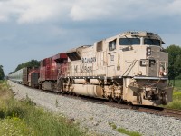 CP 246 slows as it approaches the River Road crossing outside of Welland Ontario with military tribute 7021 leading the way.  7021 has been flipping back and fourth on 246/247 over the past week and has offered many opportunities for railfans to get their pictures!  Storms were rolling into Southern Ontario on this afternoon making for some dramatic lighting.  