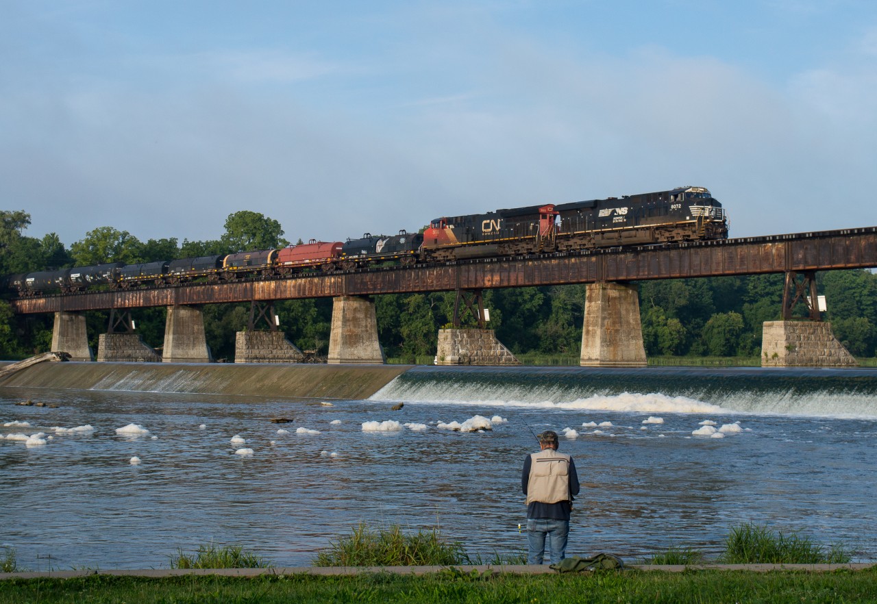 CN L501 crosses the Grand River in Caledonia behind NS 8072, CN 3000 and a massive 96 car train.  This is the first foreign unit to make it down the Hagersville Subdivision since 2005 when NS and Conrail power made it down the line with steel slab trains from the US.  Having grown up on this line I never would have imagined that I'd be catching a foreign leader going through my hometown.