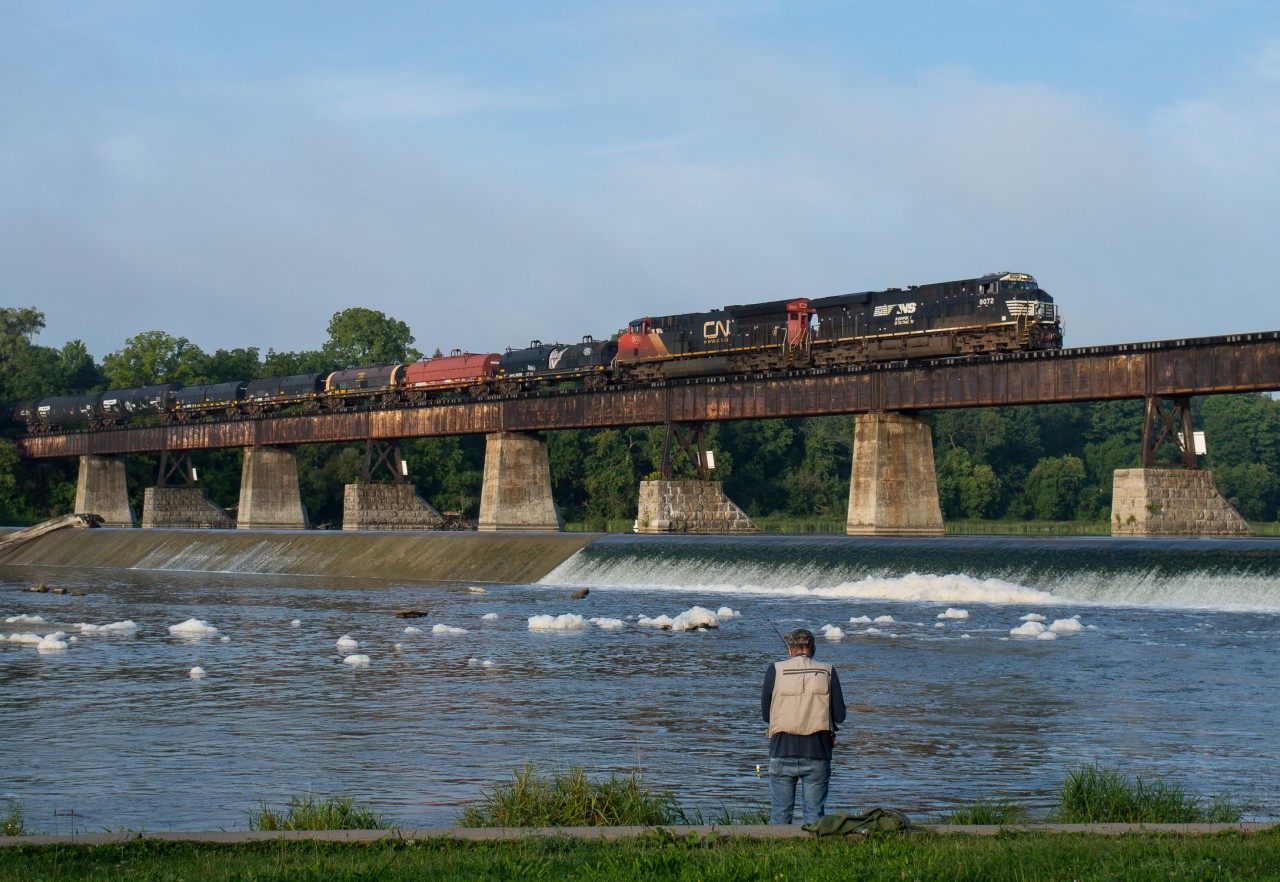 CN L501 crosses the Grand River in Caledonia behind NS 8072, CN 3000 and a massive 96 car train.  This is the first foreign unit to make it down the Hagersville Subdivision since 2005 when NS and Conrail power made it down the line with steel slab trains from the US.  Having grown up on this line I never would have imagined that I'd be catching a foreign leader going through my hometown.
