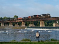 CN L501 crosses the Grand River in Caledonia behind NS 8072, CN 3000 and a massive 96 car train.  This is the first foreign unit to make it down the Hagersville Subdivision since 2005 when NS and Conrail power made it down the line with steel slab trains from the US.  Having grown up on this line I never would have imagined that I'd be catching a foreign leader going through my hometown.