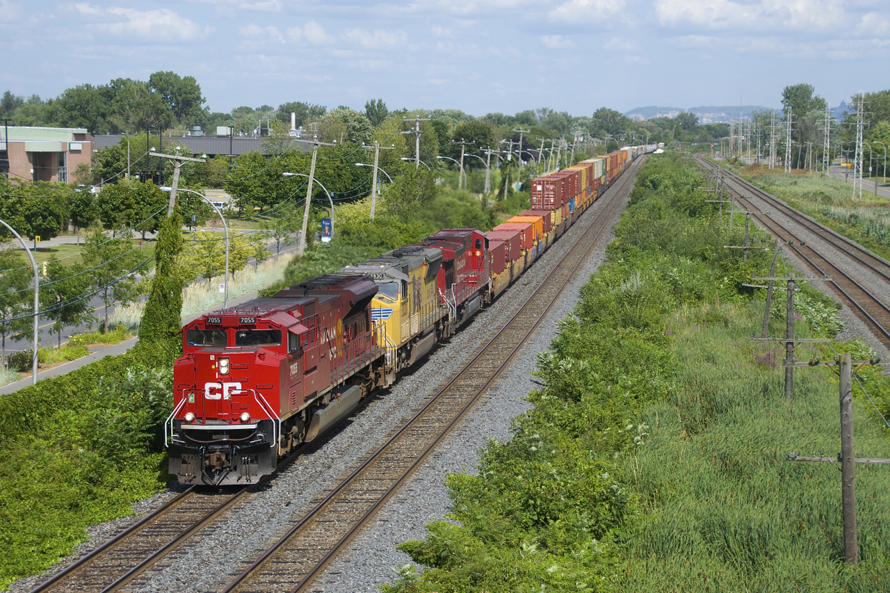CP 143 has a nice lashup composed of CP 7055, UP 3830 & CP 8074 as it heads west. On the rear of the train is an entire CP 651 (empty ethanol train) and in fact the power and the ethanol cars would continue out of Toronto as CP 651 the next day.