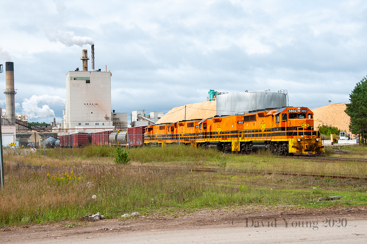 Genesee and Wyoming having threatened to shutter the entire line between Sudbury and Sault Ste. Marie and suspending operations for a brief amount time (can't remember the exact amount, a week- maybe two?) re-appears at the Domtar mill in Espanola to switch the plant. It seems every 10 years or so the American company lobbies the Provincial and Federal governments for millions of dollars in grants to keep up with maintenance threatening to permanently close the line, having done so again in 2020, reaching another successful resolution in May 2021.