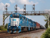 CN 583 departs Paris West with a trio of GMTX units.