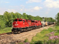 It was rare to find an SD70 ACu leading and it still is with all the troubles they have been having but as luck would have it, I got this one. It was getting on to dinner time when CP 7047 with CP 6239 finally made their way past the Third line and mile 75.1 on their northbound trip up the Hamilton sub. The shadows were creeping in and the clouds were causing some issues but when the time came, the sun came out.