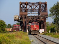 CP's 0630 yard job is pictured crossing the Jackknife Bridge in Thunder Bay with the 8100 solo and 85 loads of potash from Mosaic on the drawbar. The potash had come in previously on a 620 which was joint unit potash and grain. The 85 loads are destined for Thunder Bay Terminals Ltd, which was a busy place in my week in town, handling quite a bit of potash as well as 100 loads of coke from CN. <br><br>The bridge, which is a rather impressive structure, was completed in April 1913 and formerly had two functioning decks - one for rail (lower) and another for cars (upper), which was dismantled in 2004. For those curious to see, David Young previously offered <a href="http://www.railpictures.ca/?attachment_id=1479" target="_blank">this view</a> of the other side of the bridge.