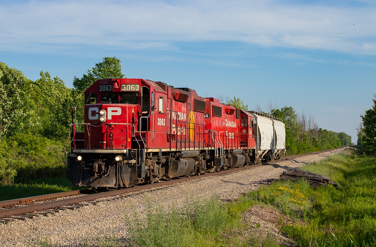 While waiting for this C93 to come over, I heard my true target for the evening - CP TE21 - give a track release on the Hamilton Sub so that CP 254 could get headroom for their work in Welland. I knew C93 was close so I waited it out for them and grabbed a few shots and then went directly to this spot for TE21. On the way there I heard them restore the switch for the Montrose so knew I'd be cutting it real close. Sure enough, headlights were already in view when I got here to Yokom Road to watch TE21 roll past with two cars for Washington Mills in Niagara Falls.